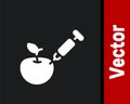 White Genetically modified apple icon isolated on black background. GMO fruit. Syringe being injected to apple. Vector Royalty Free Stock Photo