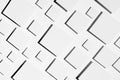 White geometric background of rhombuses in hard light with strict black shadows, tile pattern, top view. Modern abstract. Royalty Free Stock Photo
