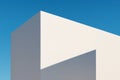 White Geometric Cut Facade with Angular Shadow and Blue Sky Royalty Free Stock Photo