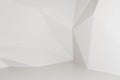 White geometric polygonal background. Walls in studio.