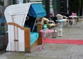 Traditional German Beach Chair Strandkorb with Blanket and Colorful Tables in Hanover Royalty Free Stock Photo