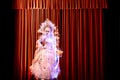 The white ghost in front of the curtain a night of theater Royalty Free Stock Photo