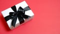White gift box with black ribbon on the table Christmas and new year concept, Valentine Concept. Royalty Free Stock Photo
