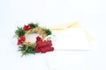 White gift box with golden ribbon bow. Christmas letter envelope with blank paper card Royalty Free Stock Photo