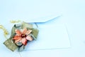 White gift box with golden ribbon bow. Christmas letter envelope with blank paper card Royalty Free Stock Photo