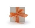 White gift box with orange ribbon bow isolated on white background Royalty Free Stock Photo