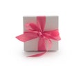White gift box with pink ribbon bow isolated on white background Royalty Free Stock Photo