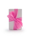 White gift box with pink ribbon bow isolated on white background Royalty Free Stock Photo
