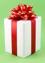 White Gift Box with Red Ribbon Royalty Free Stock Photo