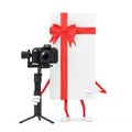 White Gift Box and Red Ribbon Character Mascot with DSLR or Video Camera Gimbal Stabilization Tripod System. 3d Rendering Royalty Free Stock Photo