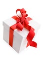 White Gift Box with Red Satin Ribbon Bow Royalty Free Stock Photo