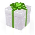 White gift box with snowflakes and green bow.