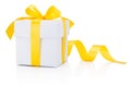 White gift box tied yellow ribbon bow Isolated on white background Royalty Free Stock Photo