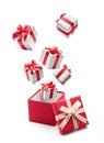 White gift boxes pop out from red open gift box Royalty Free Stock Photo