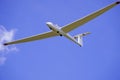 White glider with blue cloudless sky Royalty Free Stock Photo