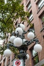 White Globes on Classic Old Lamp Post Royalty Free Stock Photo