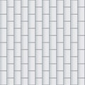 White glossy brick wall with vertical ceramic rectangle tiles seamless pattern. Home interior, bathroom and kitchen wall Royalty Free Stock Photo