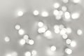 White glowing bokeh lights creating abstract pattern. Color of the year concept Royalty Free Stock Photo