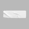 White glued crumpled rectangle sticker mock up. Blank white adhesive paper or plastic sticker label with wrinkled and