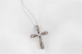 White Gold Cross Pendant With Chocolate Diamonds On Soft White Royalty Free Stock Photo