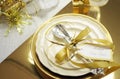 White and gold Happy New Year elegant fine dining table place setting Royalty Free Stock Photo