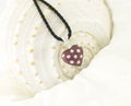 White Gold Heart Pendant With Rubies And Diamonds On SeaShell