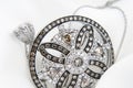 White gold pendant with diamonds on soft white background Royalty Free Stock Photo