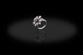 White gold precious ring female in shape flower with diamonds on