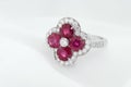 White Gold Ring With Rubies And Diamonds On Soft White Background