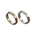 White and gold rings with small diamonds on isolated background.