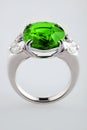 White gold or silver ring with green emerald Royalty Free Stock Photo