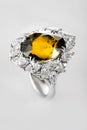 White gold or silver ring with yellow sapphire Royalty Free Stock Photo