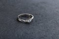 White gold wedding diamond ring on black background Royalty Free Stock Photo