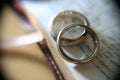 White gold wedding rings on bible Royalty Free Stock Photo