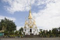 White and golden chedi of Wat Tham Khuha Sawan Temple