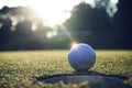 White golf ball near hole on green grass Royalty Free Stock Photo