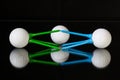 White golf balls and different colored tees Royalty Free Stock Photo