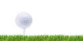 White golfball on tee in green Royalty Free Stock Photo