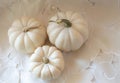 White gourds still life against lace background