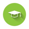 White Graduation cap icon isolated with long shadow. Graduation hat with tassel icon. Green circle button. Vector