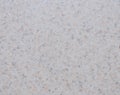 White granite with rare inclusions of gray, polished surface of natural stone Royalty Free Stock Photo