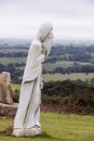 White granite statue of wandering man Royalty Free Stock Photo