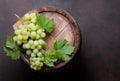 White grape on old wine barrel Royalty Free Stock Photo