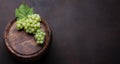 White grape on old wine barrel Royalty Free Stock Photo