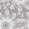 White graphic rose snowflake on a gray background. Floral seamless pattern.