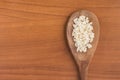 White grated corn kernels into a spoon Royalty Free Stock Photo