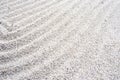 White gravel texture with subtle raked patterns for minimalist backgrounds, construction material visuals, and design projects Royalty Free Stock Photo