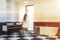 White gray bathroom corner, tub and sinks, woman Royalty Free Stock Photo