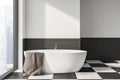 White and gray bathroom interior with tub Royalty Free Stock Photo