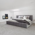 White and gray bedroom with big bed Royalty Free Stock Photo